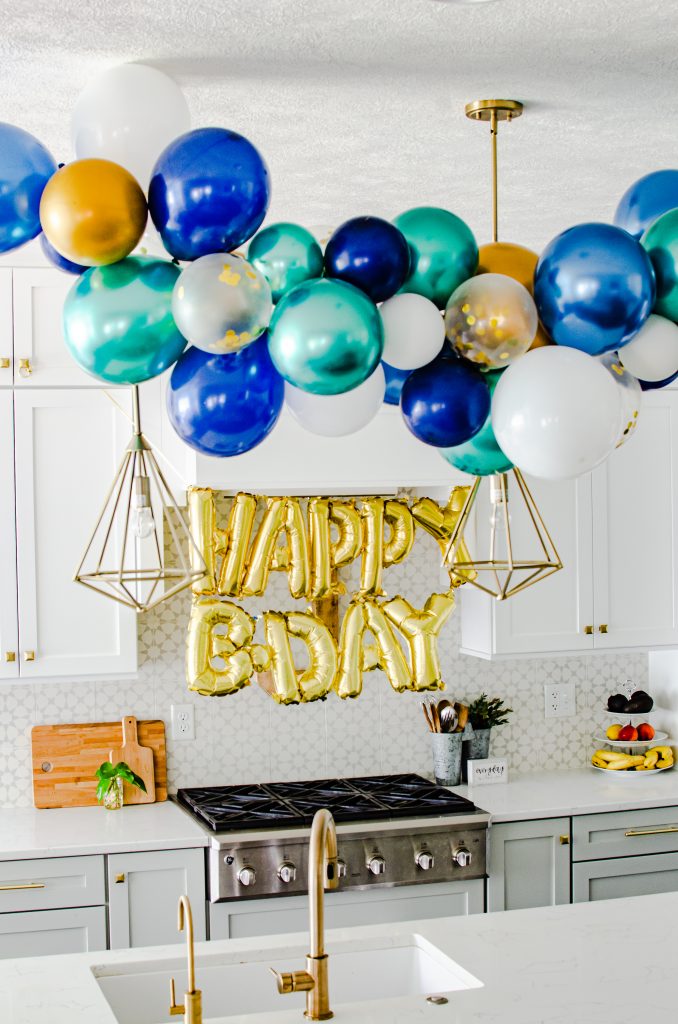 birthday balloon garland decor in kitchen