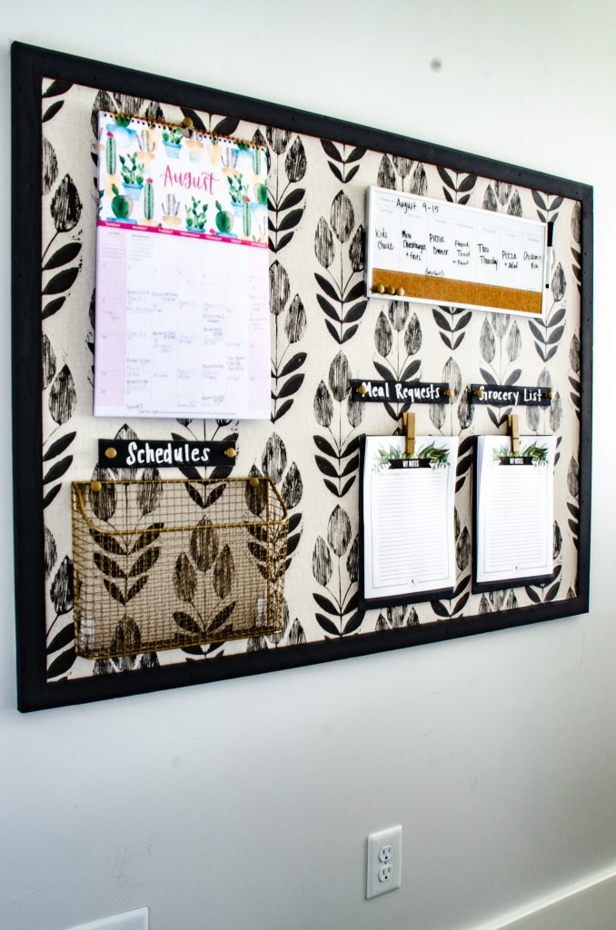 Command Center with a cork board, calendar, wall basket and white board organizer