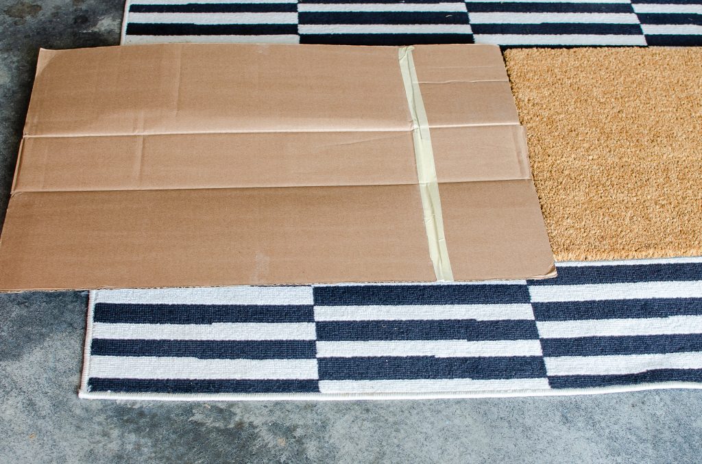 Cardboard on Rug for DIY Doormat