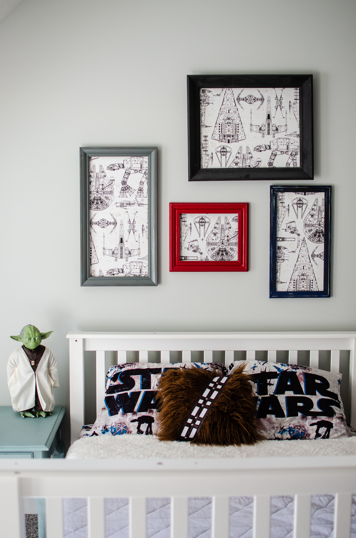 A creative kids space with Star Wars art, using wallpaper.