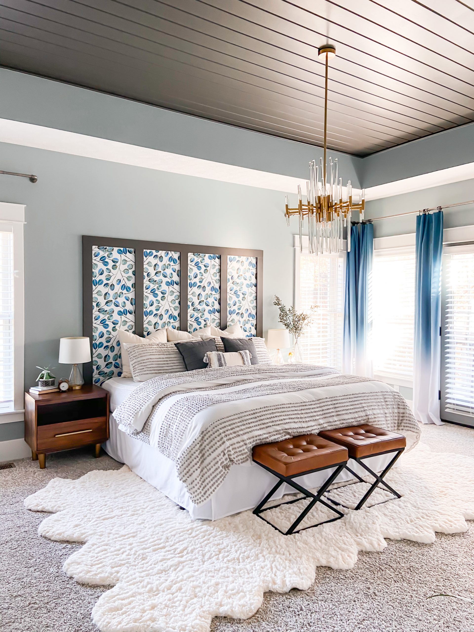 Cozy serene bedroom in blue and bronze shades