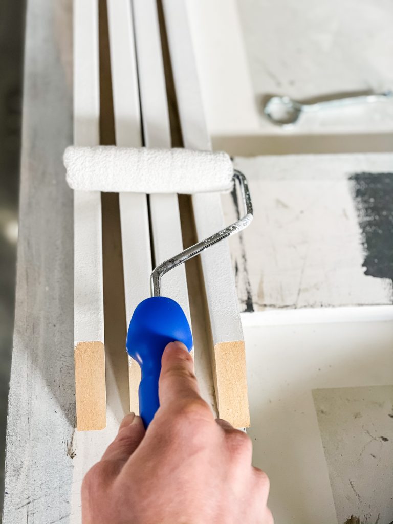 painting slat wall boards with a white paint