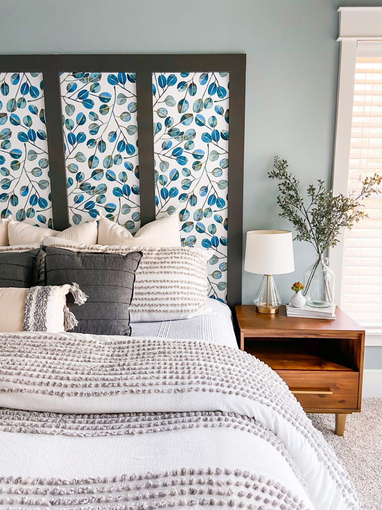 Modern bedroom wall with wooden headboard and floral wallpaper | Beautiful  Homes