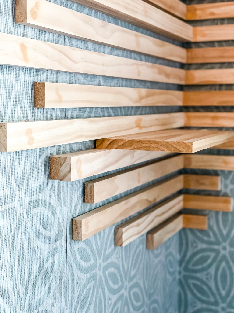 close up of the diy slat wall shoe rack